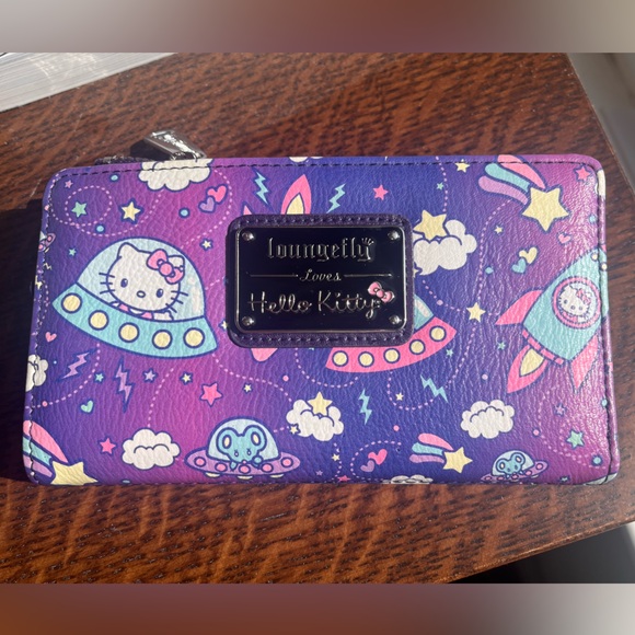 Loungefly Handbags - Loungefly Hello Kitty flap wallet